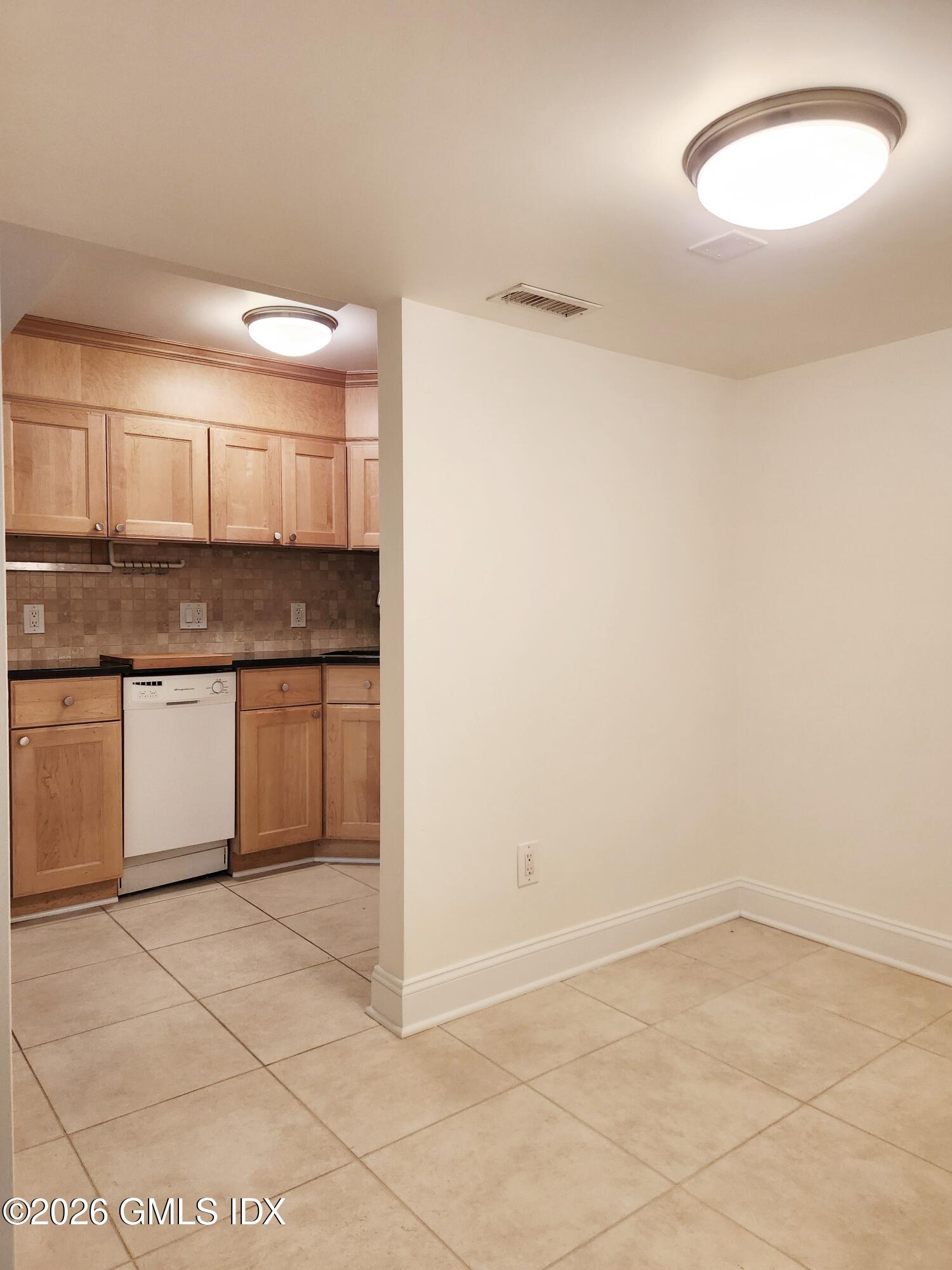 67 Alexander Street, Unit 1 Greenwich, CT 06830 - Photo 6 of 15 20260608_121404