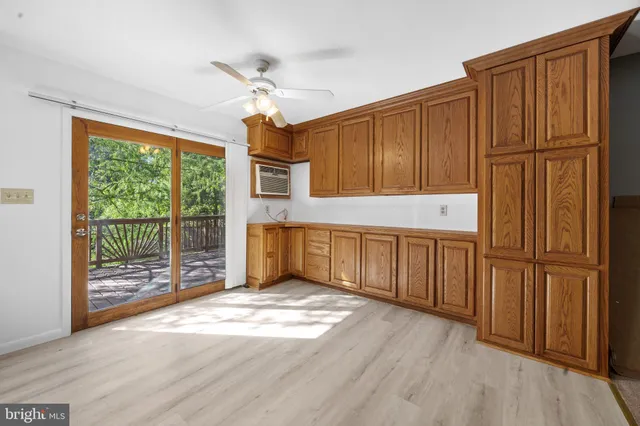 a kitchen with granite countertop a sink and a window