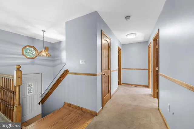 a balcony with trees in front of it