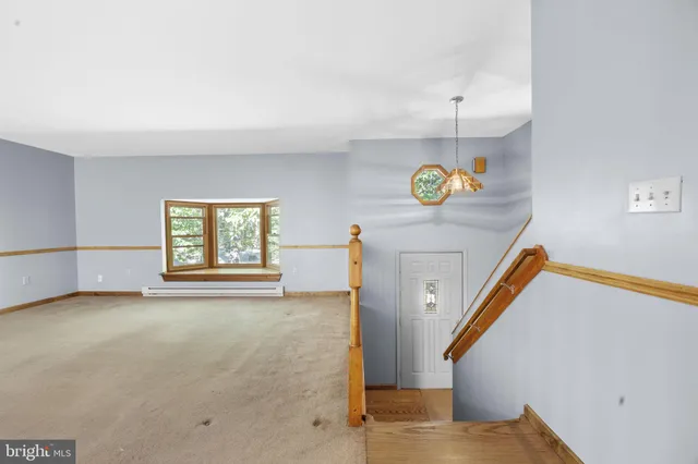 an empty room with an entryway