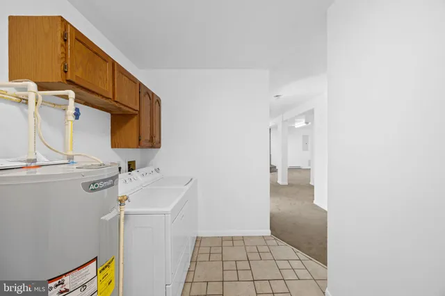 a view of a yard with large trees