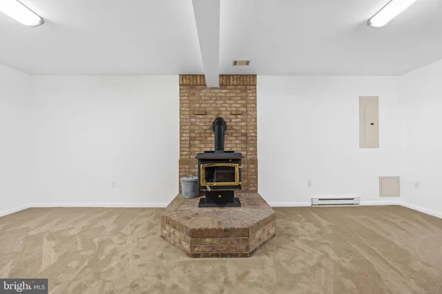 a view of a street with large trees