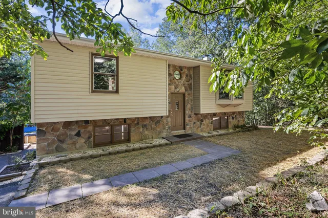 a view of a back yard of the house