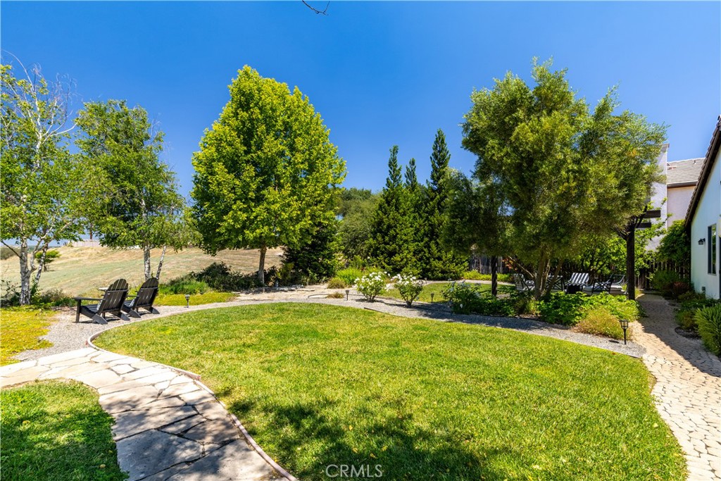 669 Red Cloud Road Paso Robles, CA 93446 - Photo 38 of 61 a view of a backyard with swimming pool