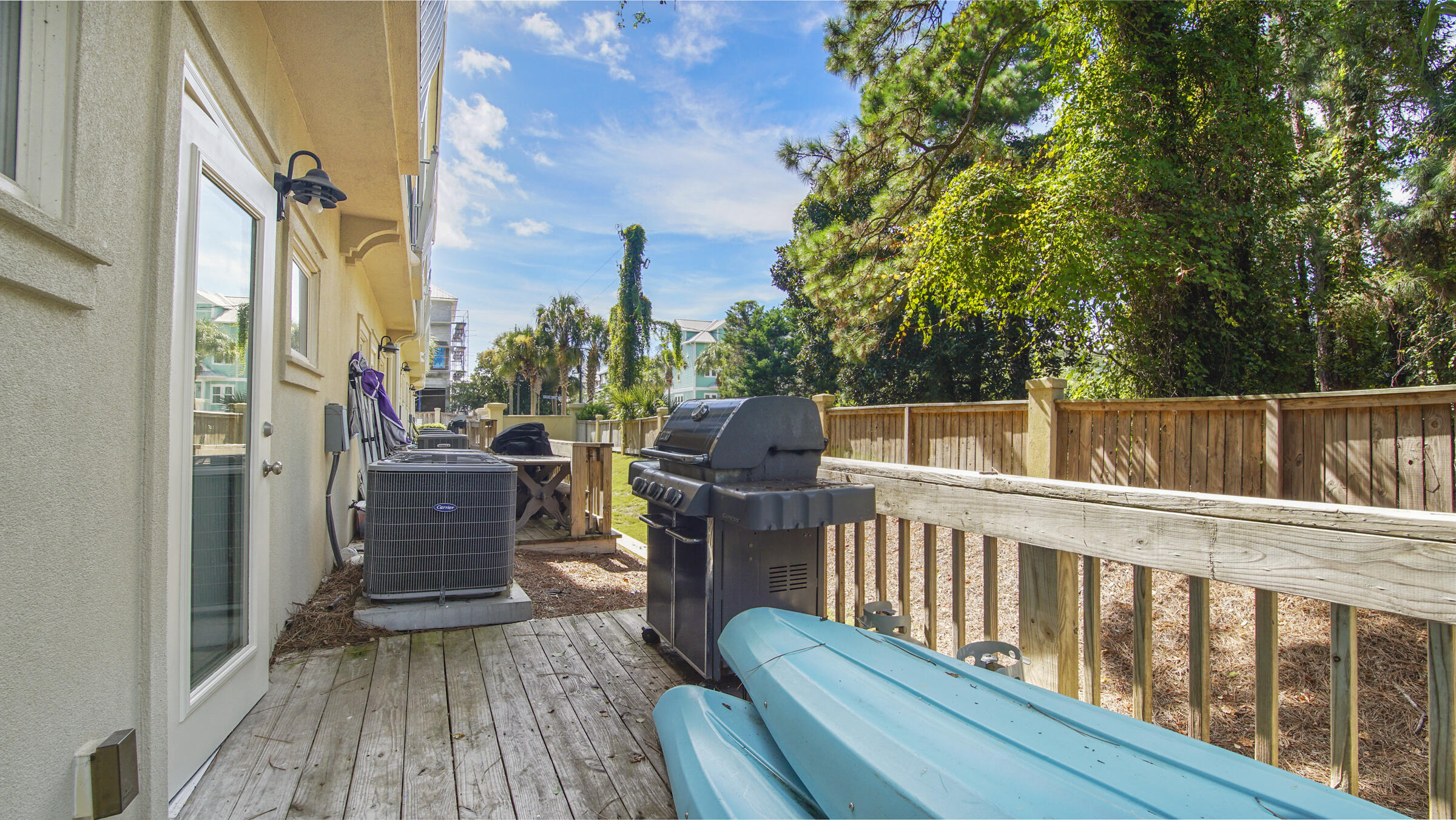 43 Coastal Grove Way, Unit 5 Santa Rosa Beach, FL 32459 - Photo 20 of 56 a view of balcony with wooden floor and seating space