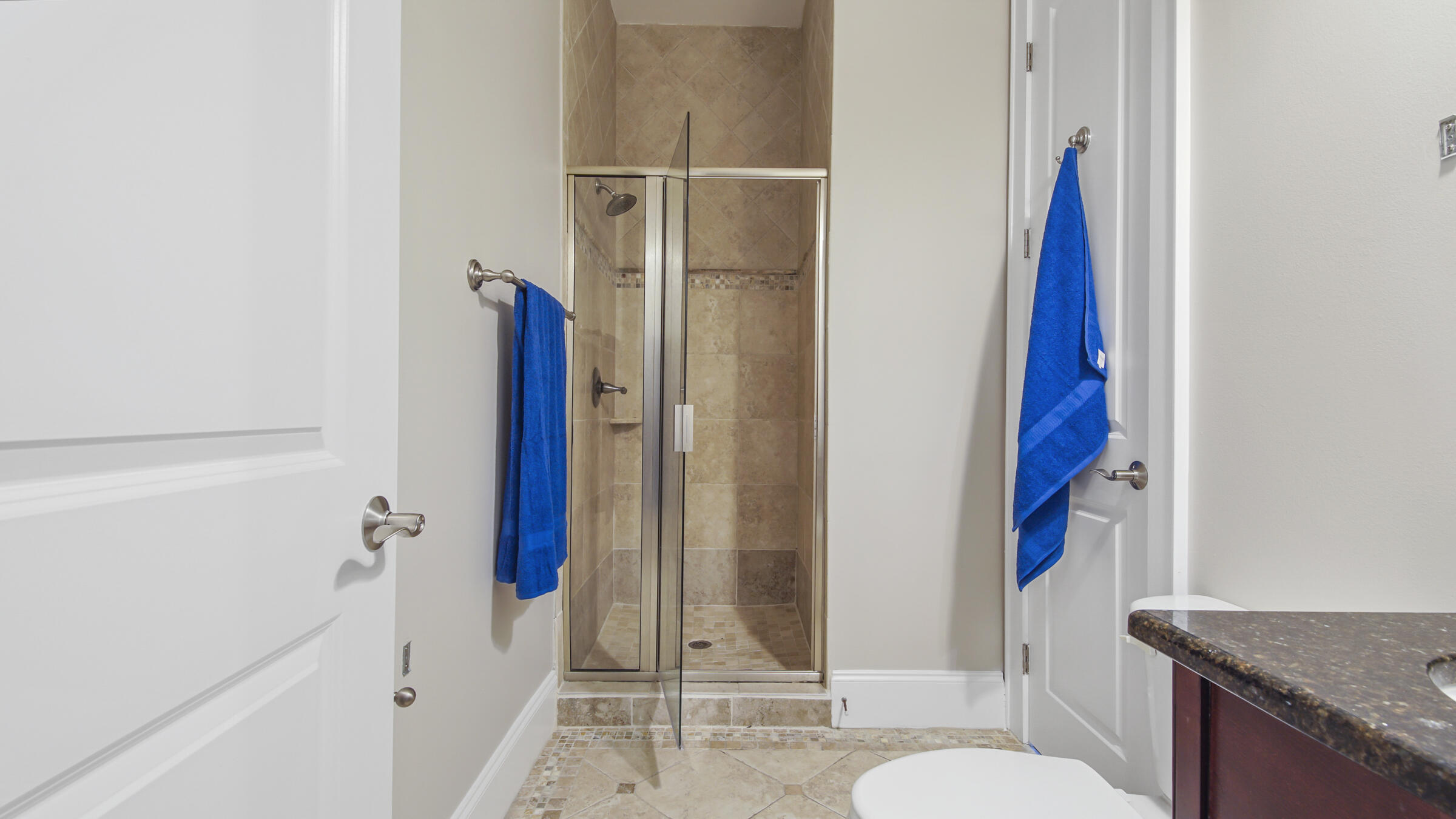 43 Coastal Grove Way, Unit 5 Santa Rosa Beach, FL 32459 - Photo 24 of 56 a bathroom with a granite countertop sink toilet and shower