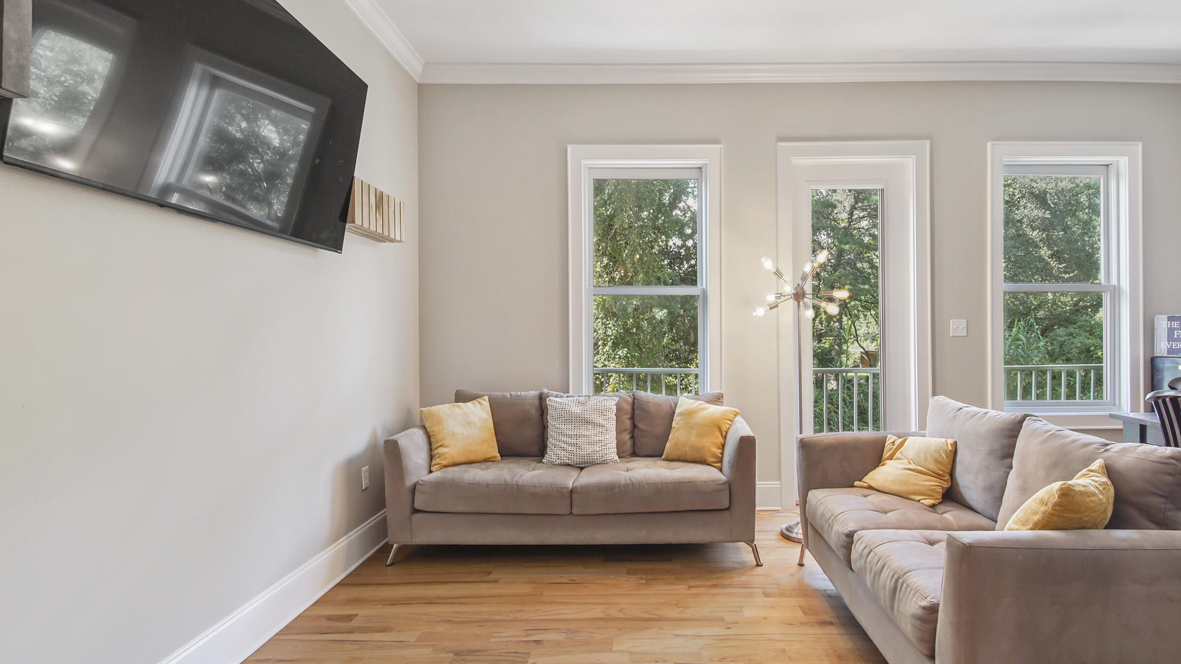 43 Coastal Grove Way, Unit 5 Santa Rosa Beach, FL 32459 - Photo 29 of 56 a living room with furniture and a large window