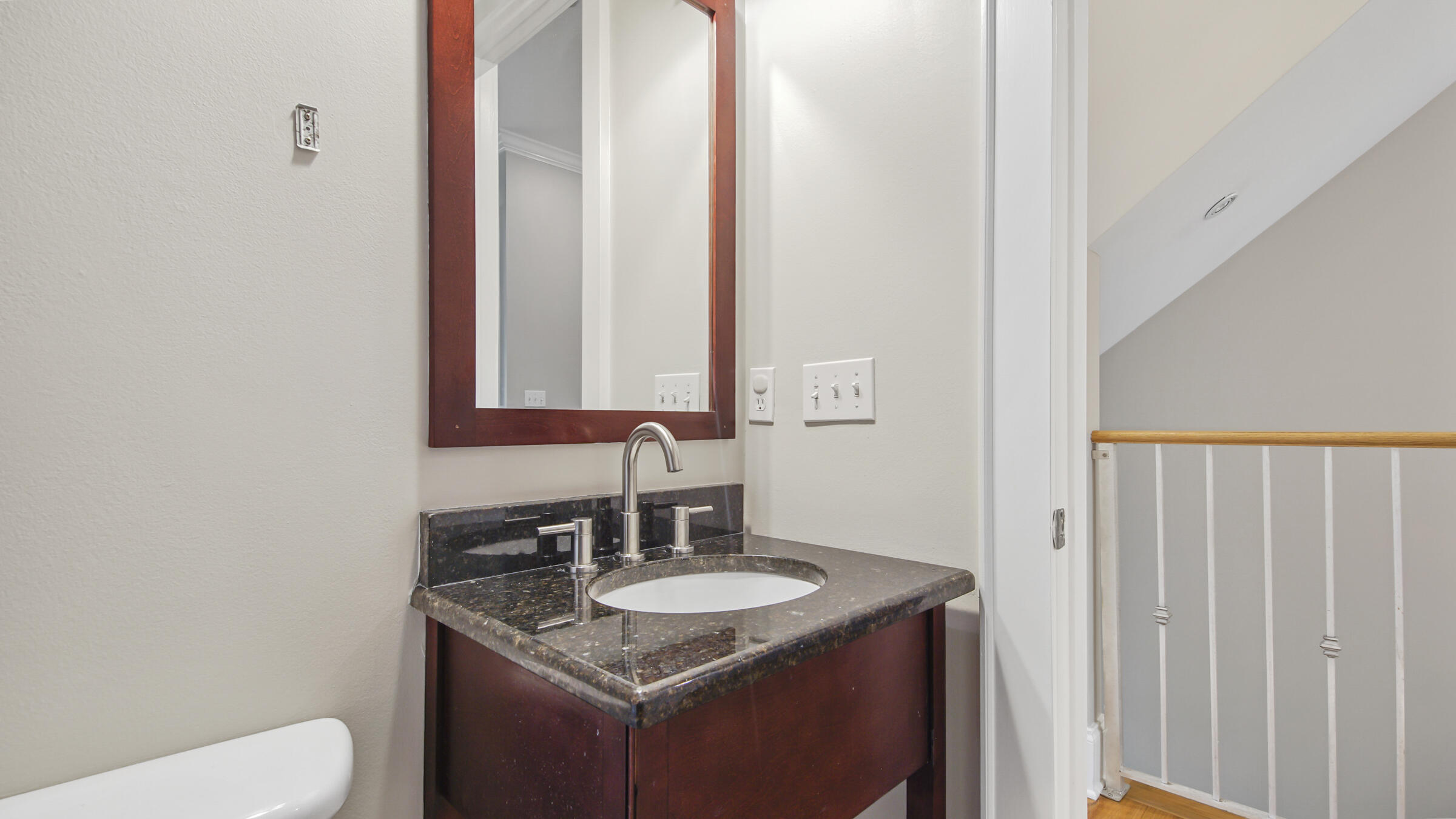 43 Coastal Grove Way, Unit 5 Santa Rosa Beach, FL 32459 - Photo 31 of 56 a bathroom with a granite countertop sink and a toilet