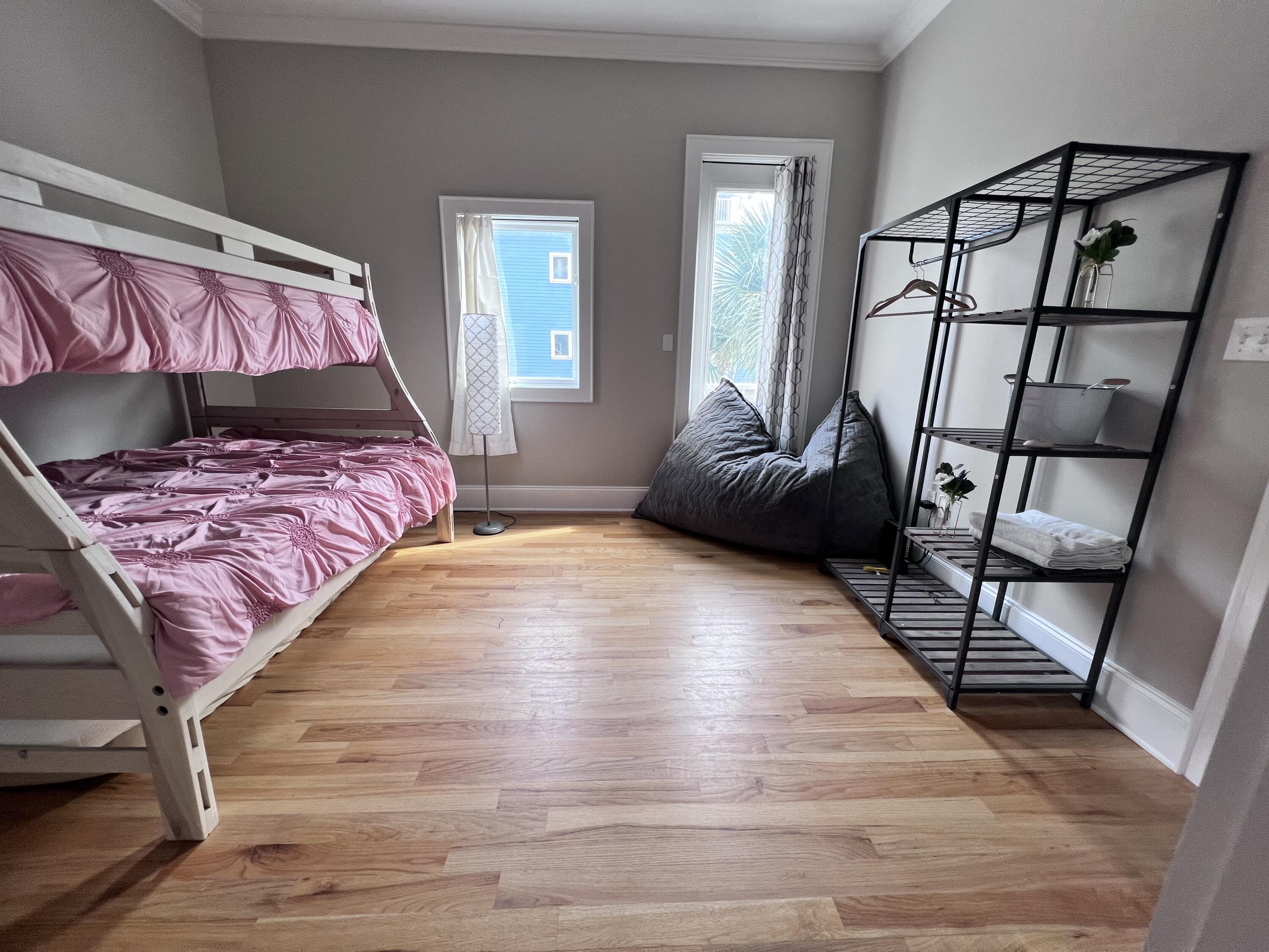 43 Coastal Grove Way, Unit 5 Santa Rosa Beach, FL 32459 - Photo 33 of 56 a bedroom with a bed and a window