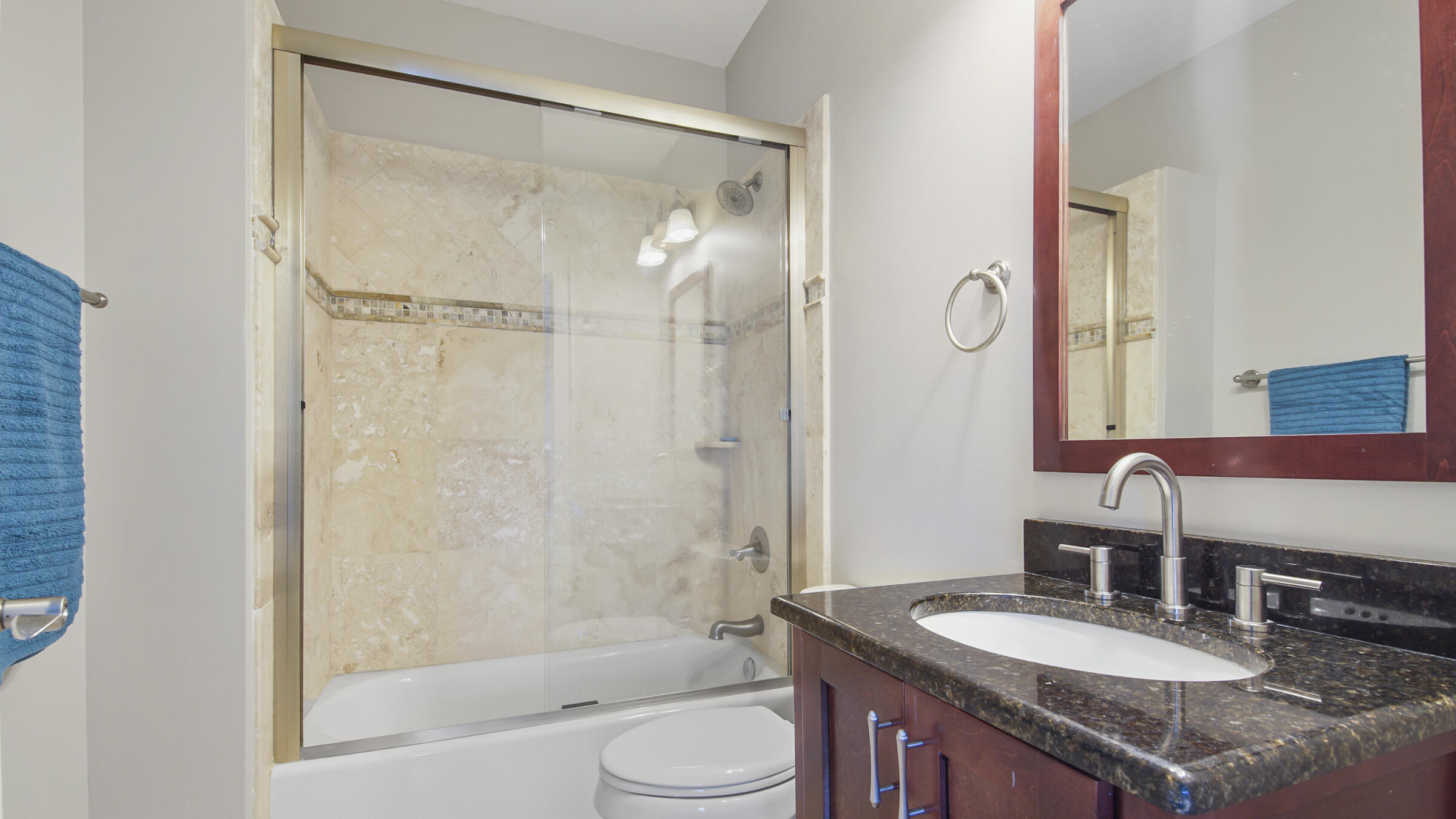43 Coastal Grove Way, Unit 5 Santa Rosa Beach, FL 32459 - Photo 39 of 56 a bathroom with a granite countertop sink toilet mirror and shower
