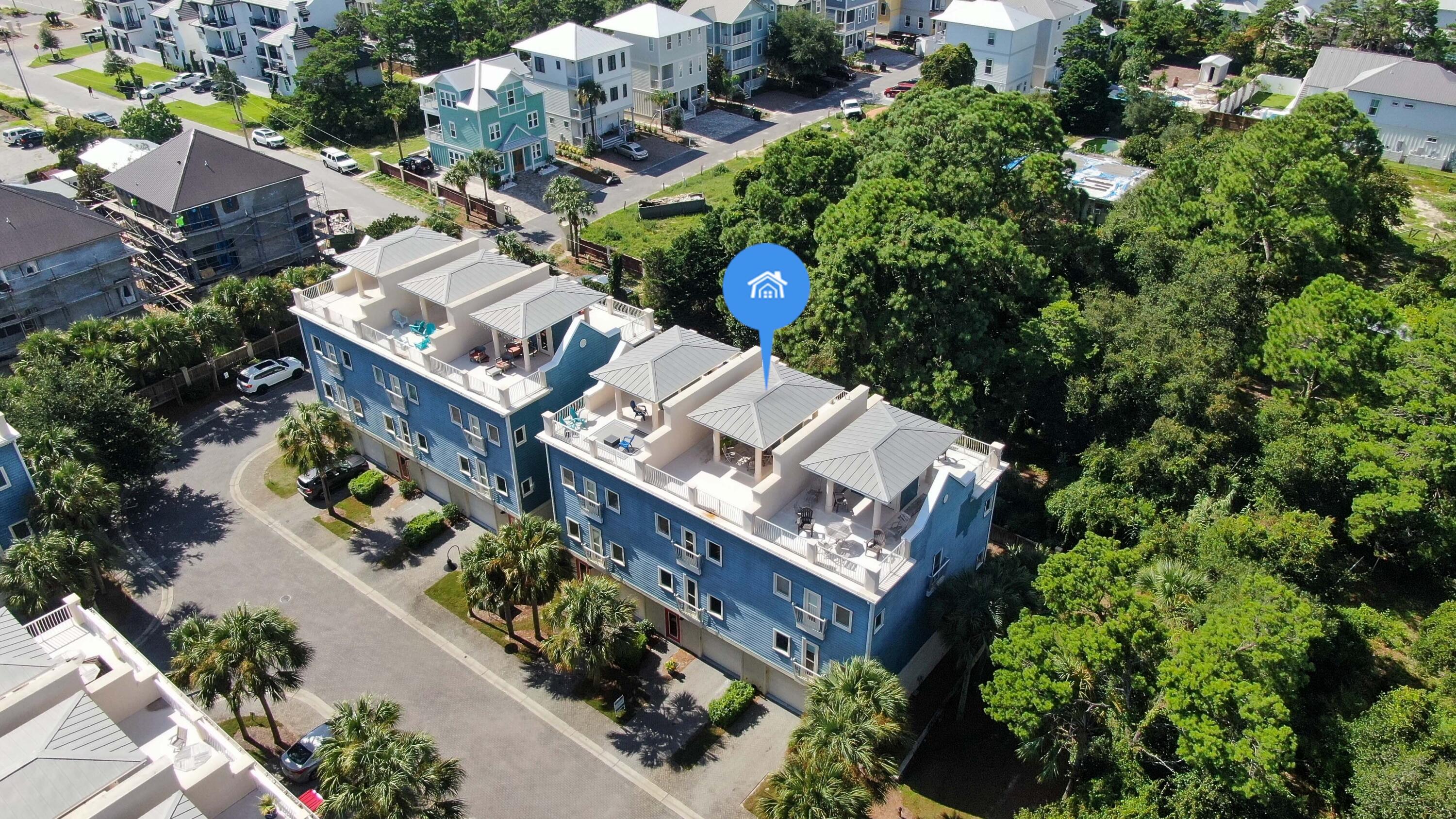 43 Coastal Grove Way, Unit 5 Santa Rosa Beach, FL 32459 - Photo 4 of 56 an aerial view of a house with a yard