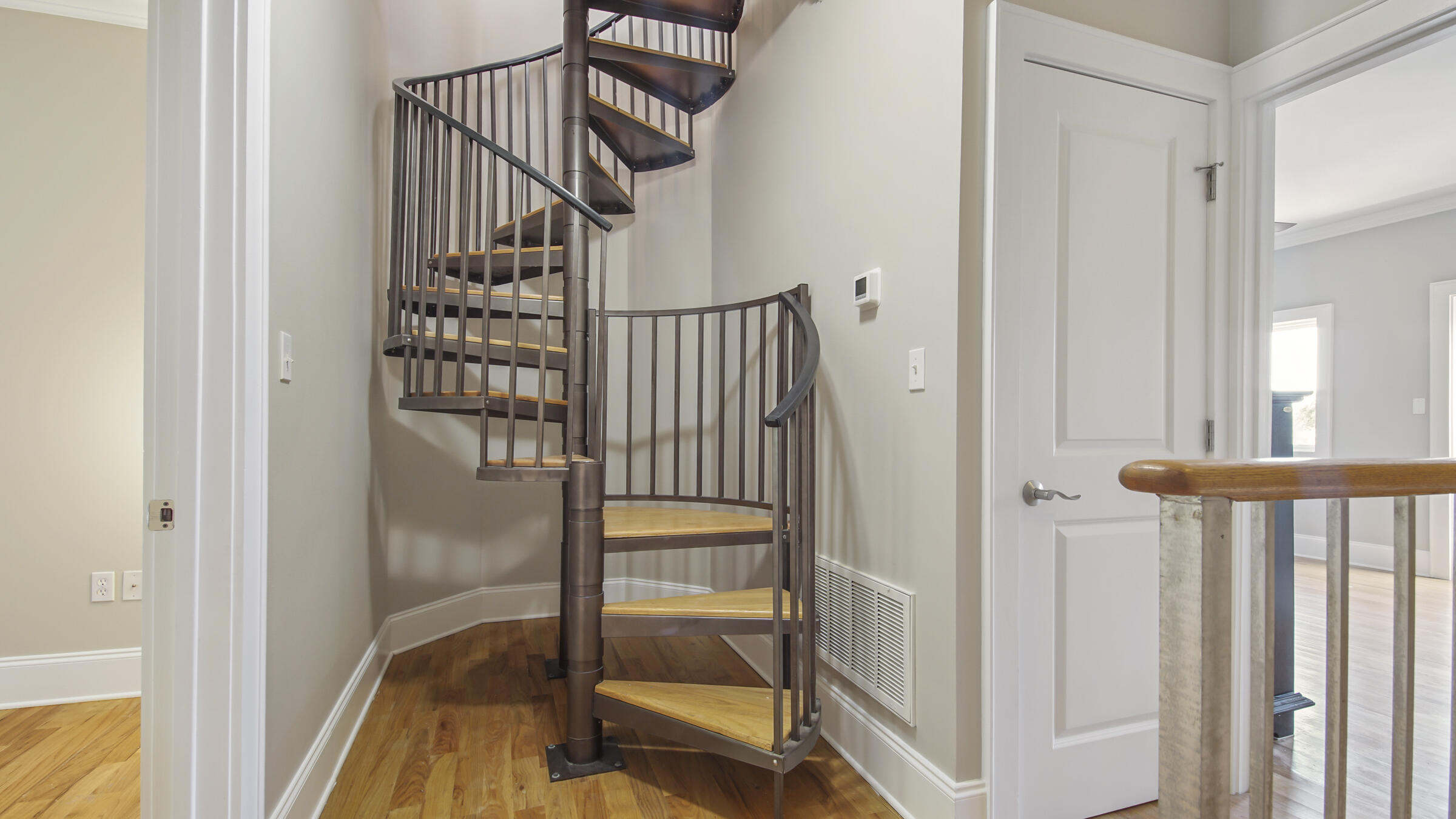 43 Coastal Grove Way, Unit 5 Santa Rosa Beach, FL 32459 - Photo 45 of 56 a view of staircase with railing and white walls