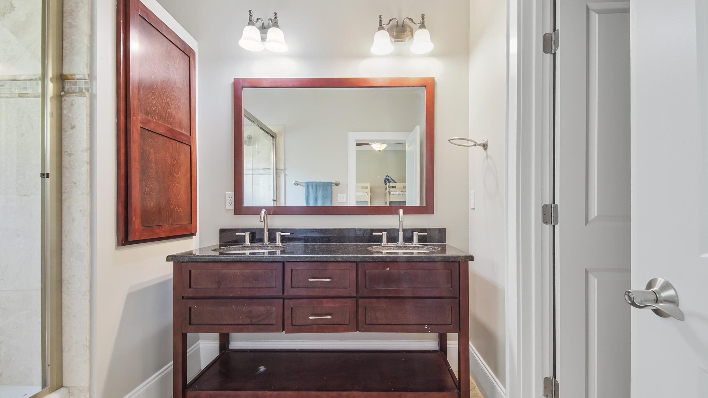 43 Coastal Grove Way, Unit 5 Santa Rosa Beach, FL 32459 - Photo 46 of 56 a bathroom with a sink vanity and mirror