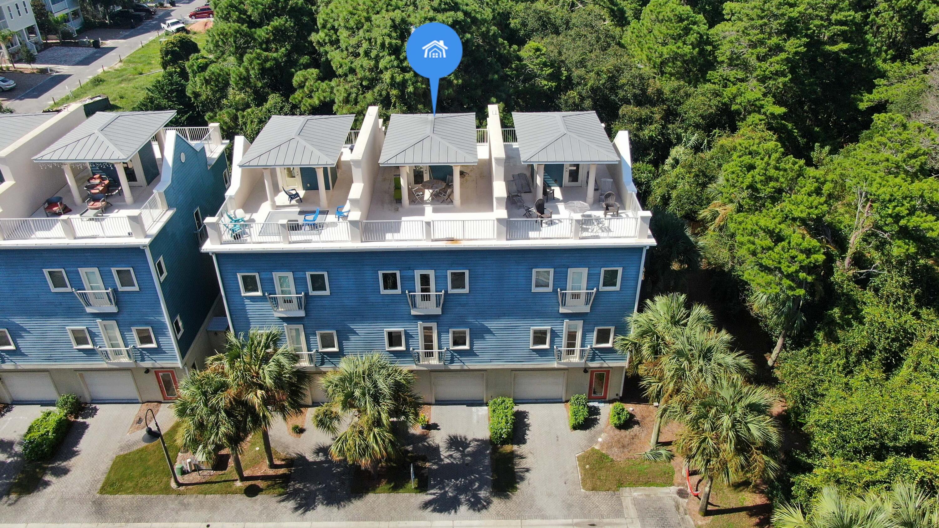 43 Coastal Grove Way, Unit 5 Santa Rosa Beach, FL 32459 - Photo 5 of 56 a view of a house with sitting area and garden