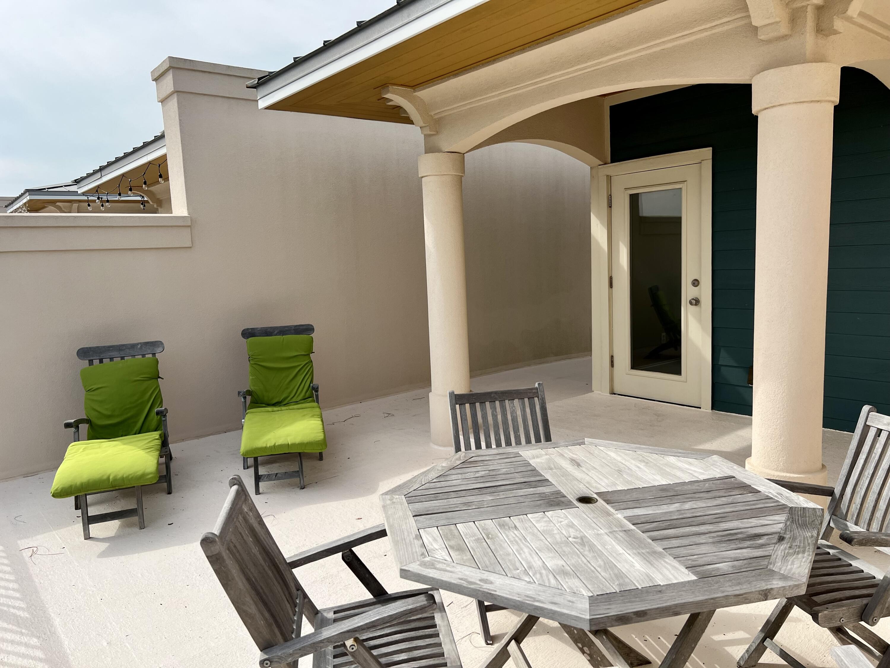 43 Coastal Grove Way, Unit 5 Santa Rosa Beach, FL 32459 - Photo 54 of 56 a bedroom with a bed and window