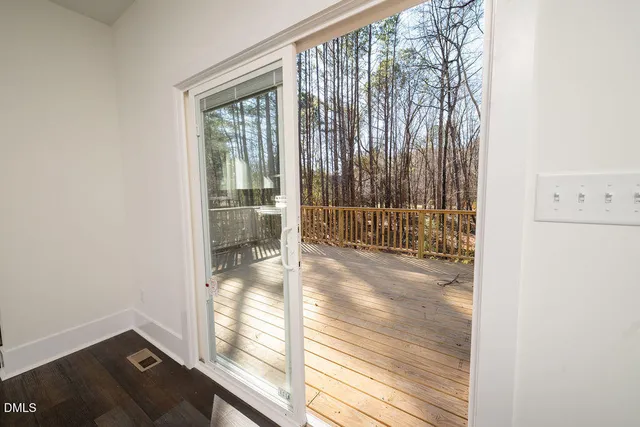 a view of a room that has a large window