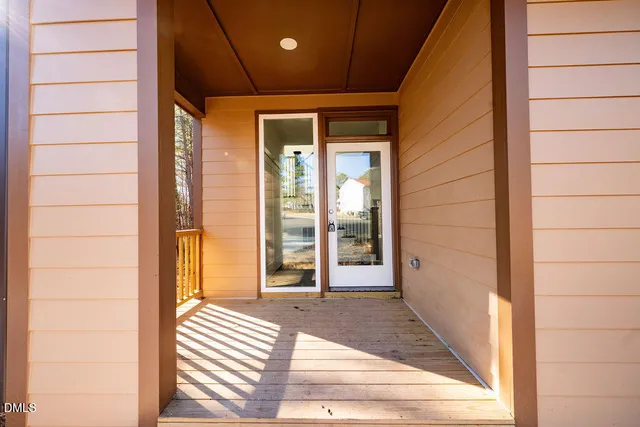 a view of a door and a window