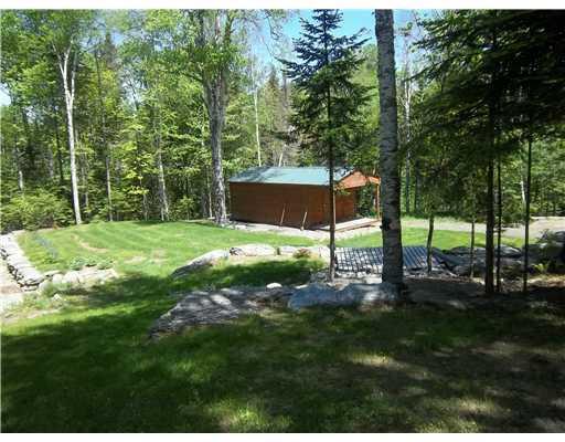 32 Bald Mountain Road Rangeley, ME 04964 - Photo 11 of 15 Exterior Back. Large lot includes a...