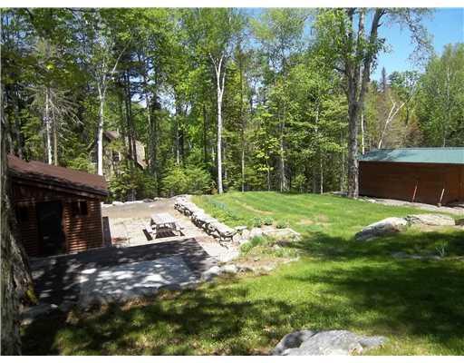 32 Bald Mountain Road Rangeley, ME 04964 - Photo 3 of 15 Exterior Back. Rear of house shows...