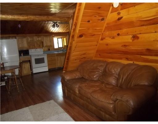 32 Bald Mountain Road Rangeley, ME 04964 - Photo 7 of 15 Living Room. Open living room,...
