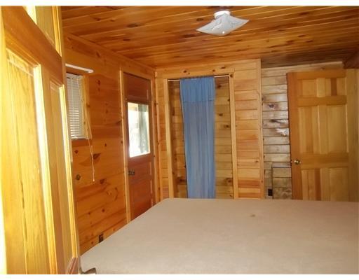 32 Bald Mountain Road Rangeley, ME 04964 - Photo 9 of 15 Bedroom. main floor bedroom has two...