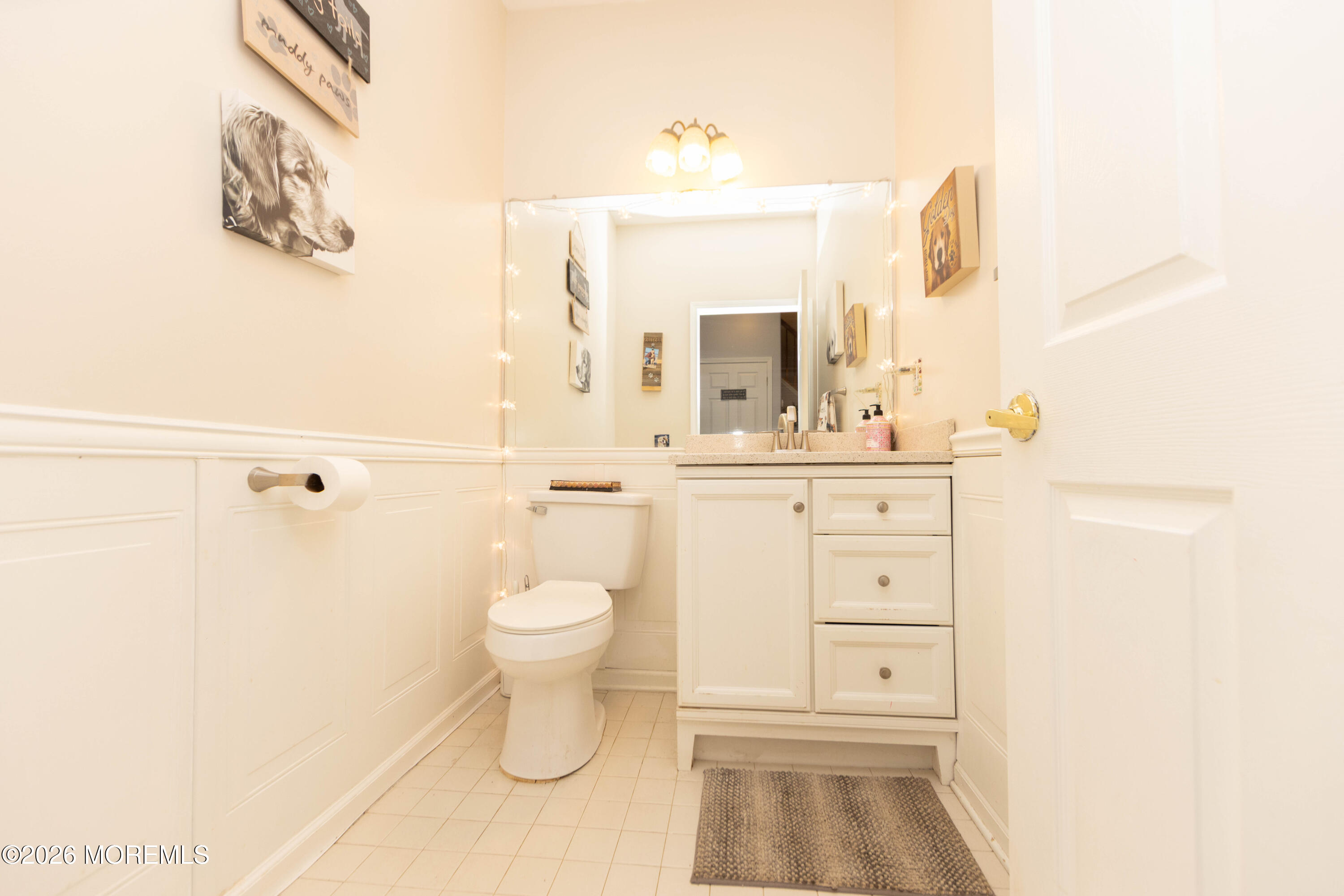 52 Riva Boulevard, Unit 1967 Brick, NJ 08723 - Photo 8 of 15 a bathroom with a sink a toilet and a mirror