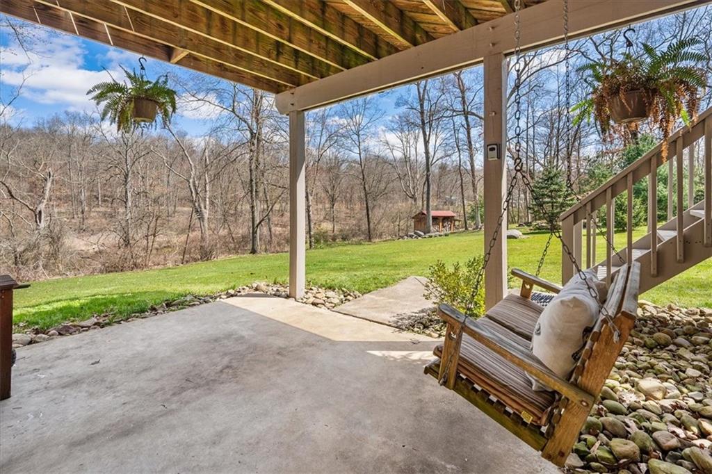4199 Woodland Road Butler, PA 16002 - Photo 23 of 42 a view of backyard with tree