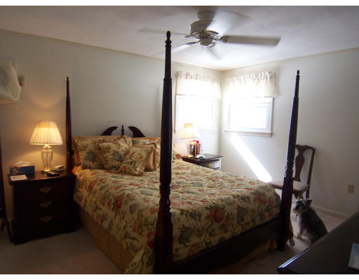 39 Heritage Road Billerica, MA 01821 - Photo 9 of 21 a bedroom with a bed and a window