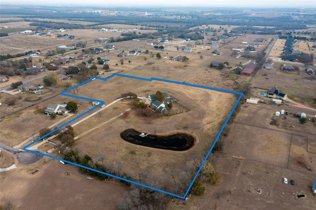 364 Parker Road, Unit A Van Alstyne, TX 75495 - Photo 5 of 39 Expansive rural acreage featuring a large pond and mature trees
