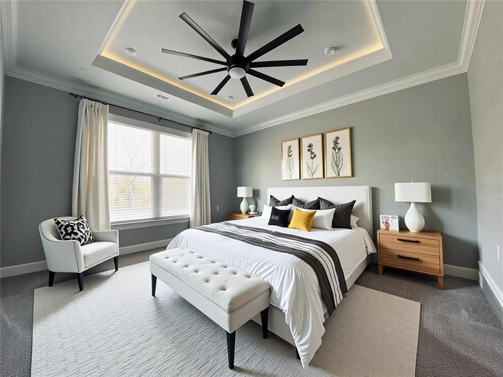 11802 Shadow Run Boulevard Riverview, FL 33569 - Photo 28 of 51 a bedroom with bed couch and window