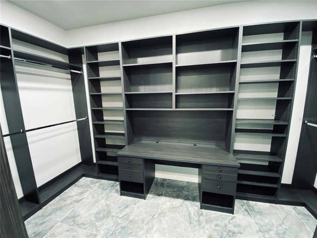 11802 Shadow Run Boulevard Riverview, FL 33569 - Photo 33 of 51 a view of closet area with empty racks