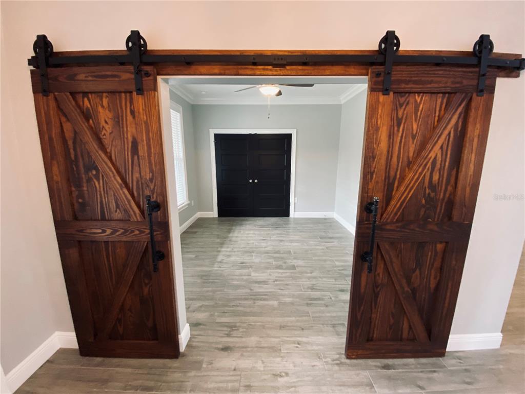 11802 Shadow Run Boulevard Riverview, FL 33569 - Photo 34 of 51 a view of entryway with wooden floor