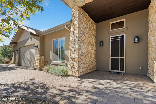 a view of a kitchen area kitchen island dining table and chairs