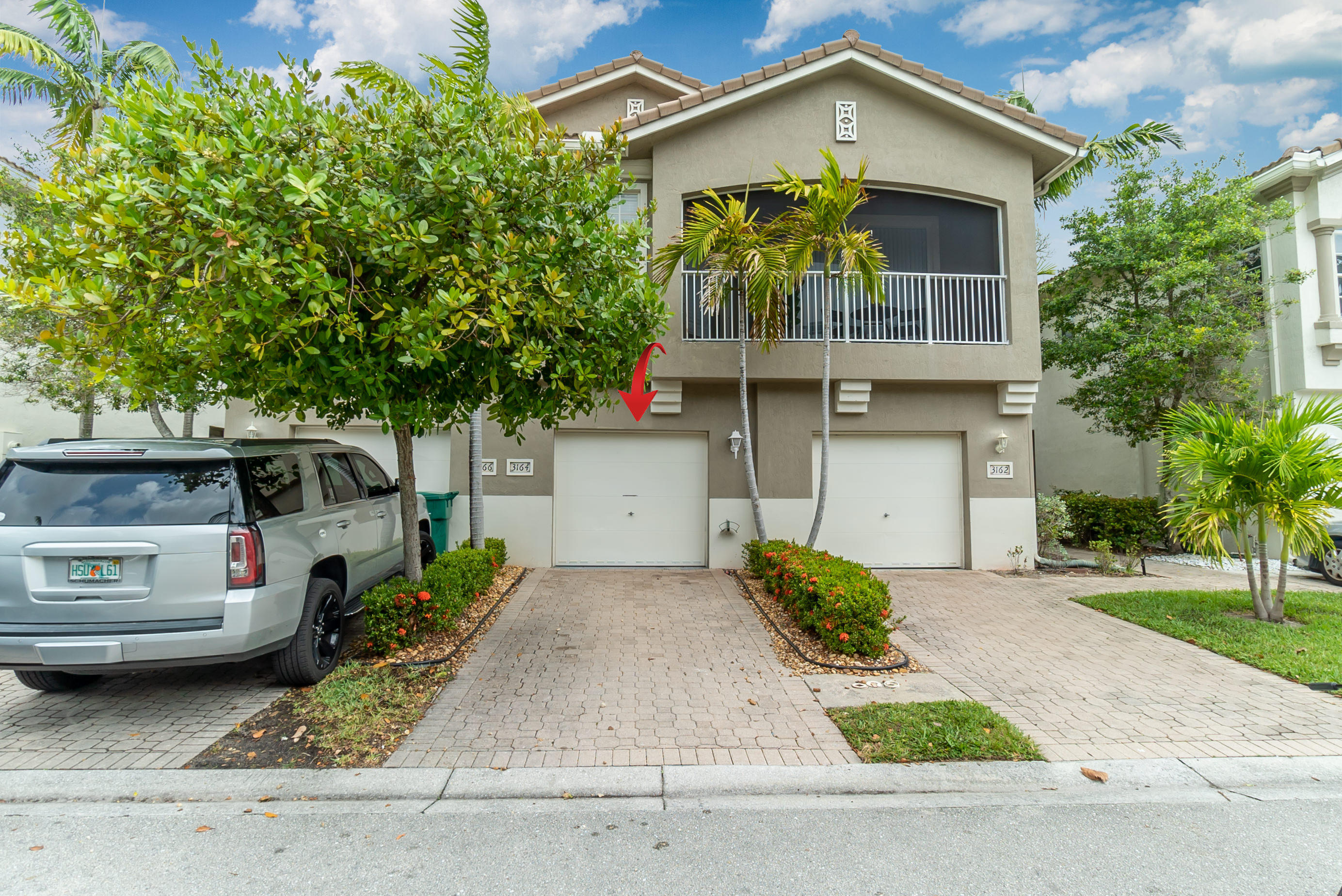 3164 Laurel Ridge Circle Riviera Beach, FL 33404 - Photo 19 of 19 19. Garage