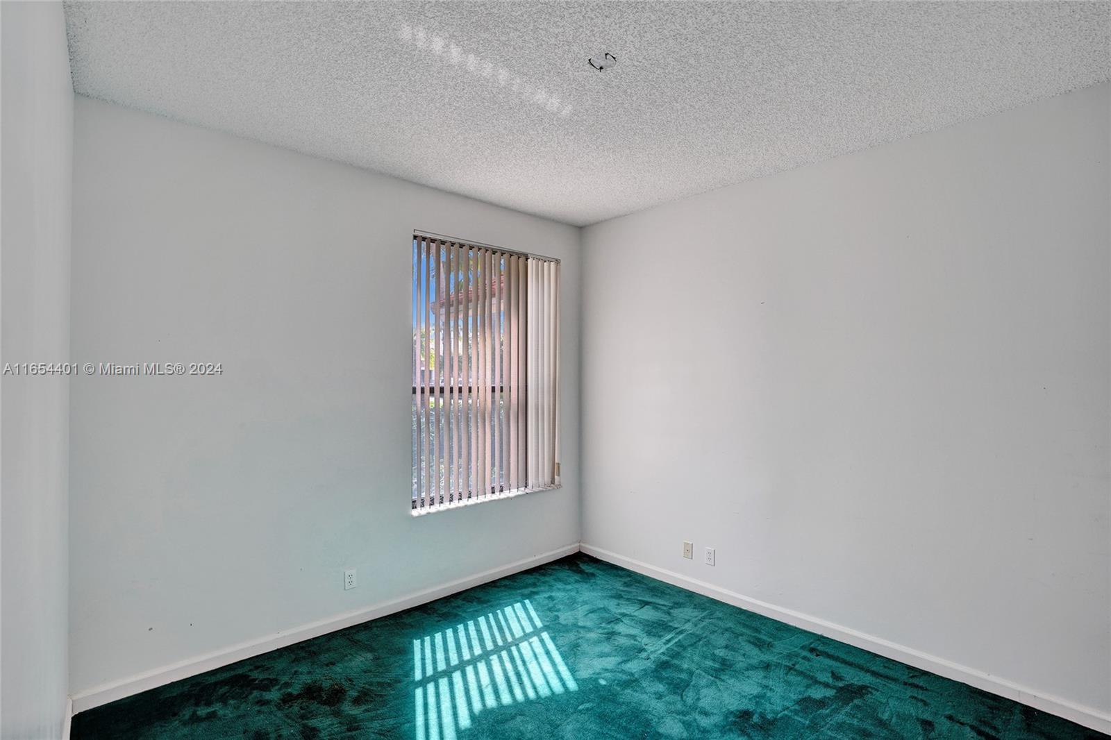 22200 Cranbrook Road Boca Raton, FL 33428 - Photo 36 of 80 a view of an empty room and window