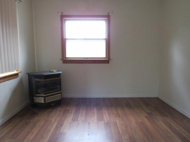 382 Walnut Hill Road Uniontown, PA 15401 - Photo 11 of 22 a room with a wooden floor and a window