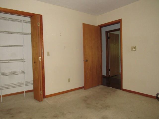 382 Walnut Hill Road Uniontown, PA 15401 - Photo 14 of 22 wooden floor and closet in a room