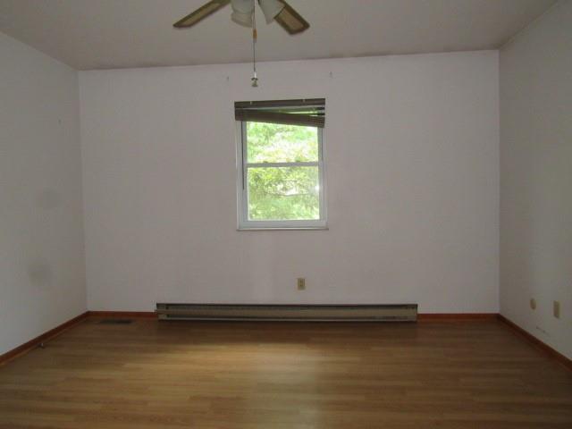 382 Walnut Hill Road Uniontown, PA 15401 - Photo 15 of 22 an empty room with a window