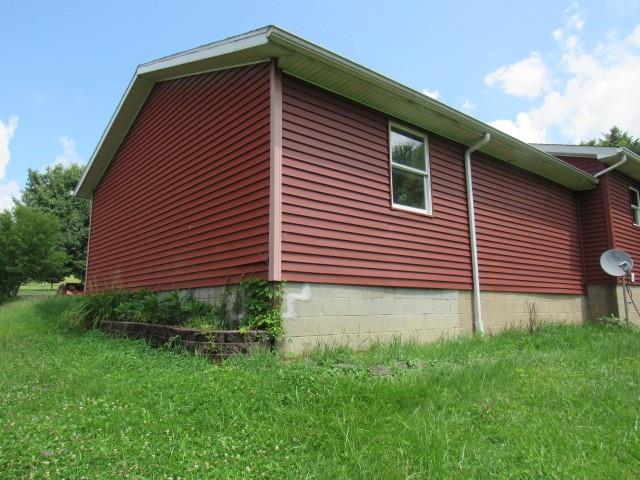 382 Walnut Hill Road Uniontown, PA 15401 - Photo 2 of 22 a front view of a house with garden