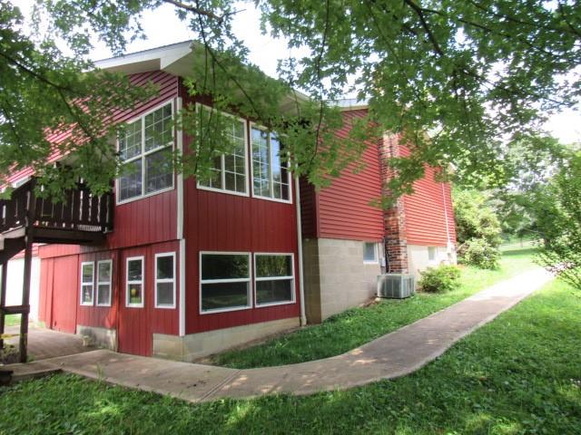 382 Walnut Hill Road Uniontown, PA 15401 - Photo 5 of 22 a front view of a house with garden