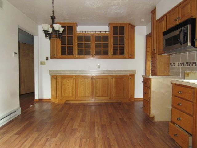 382 Walnut Hill Road Uniontown, PA 15401 - Photo 9 of 22 a view of a windows and a kitchen with wooden floor