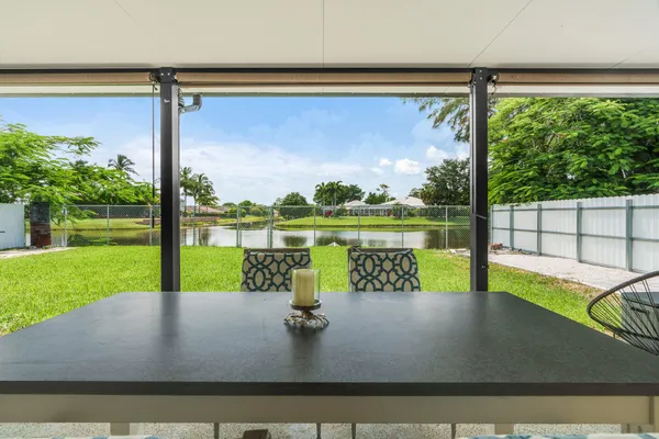 a view of a swimming pool and a porch