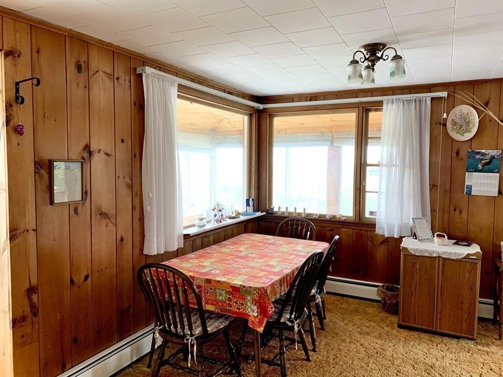 191 Phillips Road Bourne, MA 02562 - Photo 11 of 41 a dining room with furniture and window