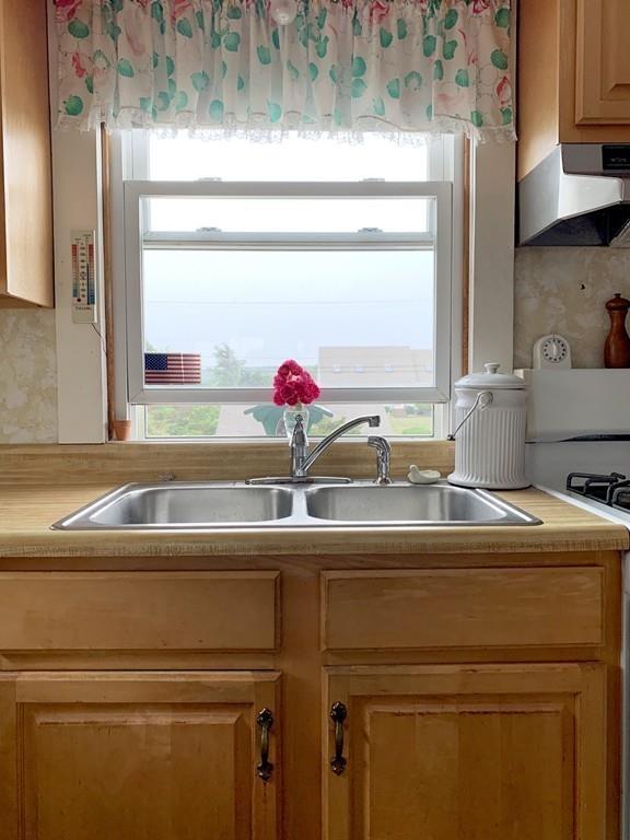 191 Phillips Road Bourne, MA 02562 - Photo 15 of 41 a bathroom with a sink and a mirror