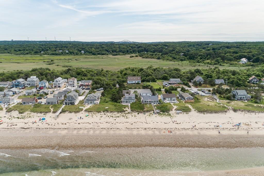 191 Phillips Road Bourne, MA 02562 - Photo 2 of 41 a view of a yard and ocean