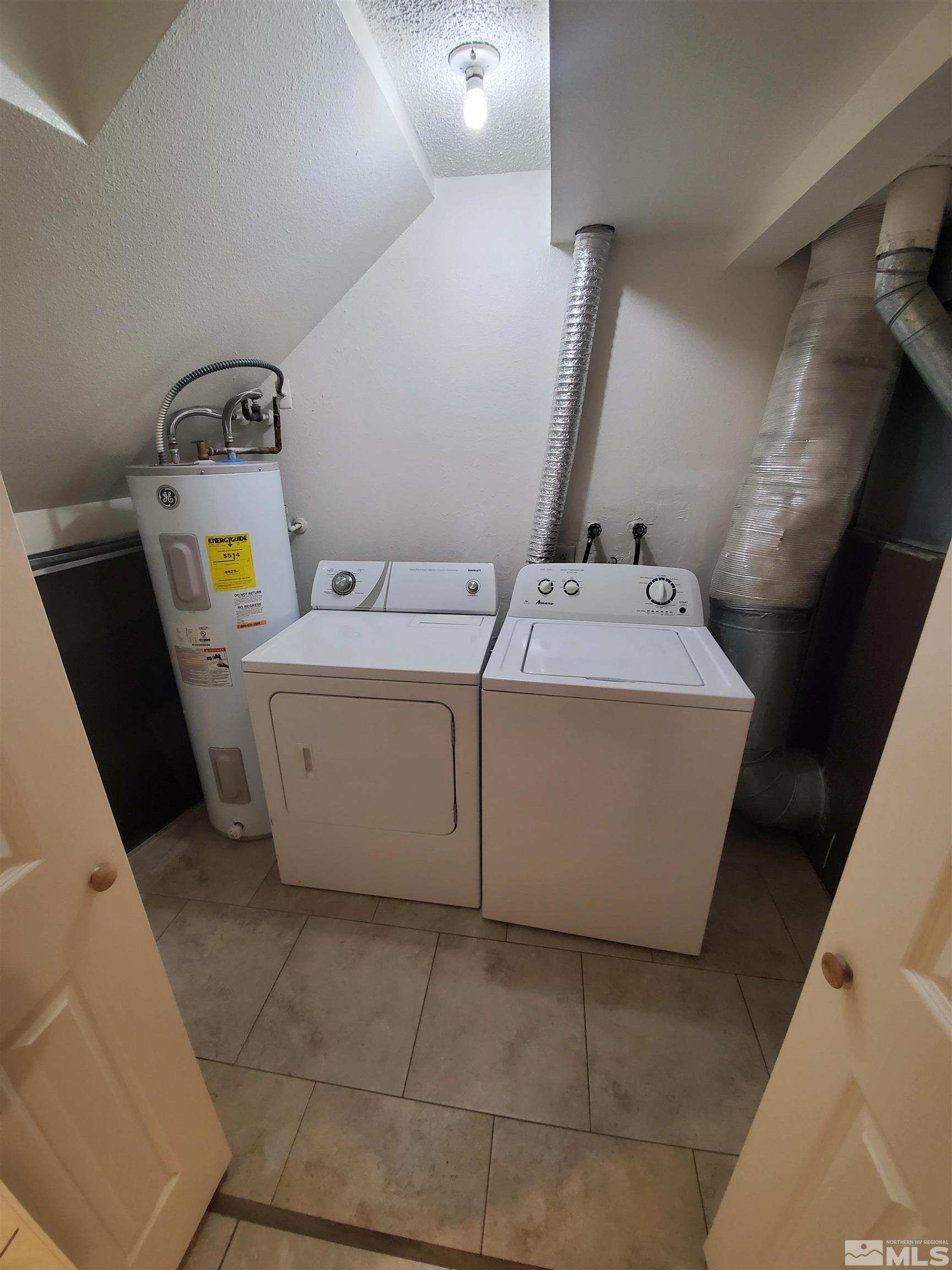 1422 East 9th Street, Unit 1 Reno, NV 89512 - Photo 14 of 22 a utility room with dryer and washer