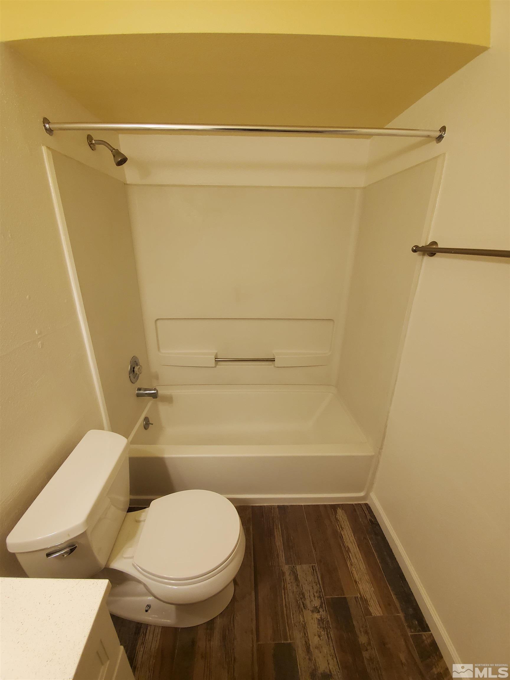 1422 East 9th Street, Unit 1 Reno, NV 89512 - Photo 22 of 22 a bathroom with a toilet and a shower