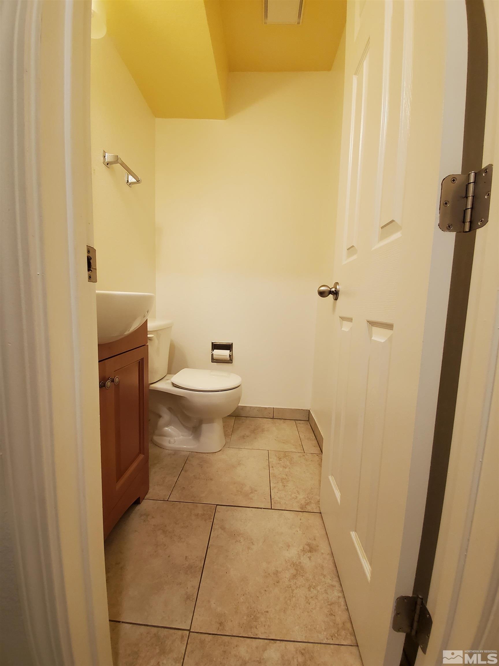 1422 East 9th Street, Unit 1 Reno, NV 89512 - Photo 10 of 22 a bathroom with a toilet and a shower