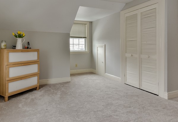 15 Charles Street Natick, MA 01760 - Photo 13 of 21 a view of an empty room with a window