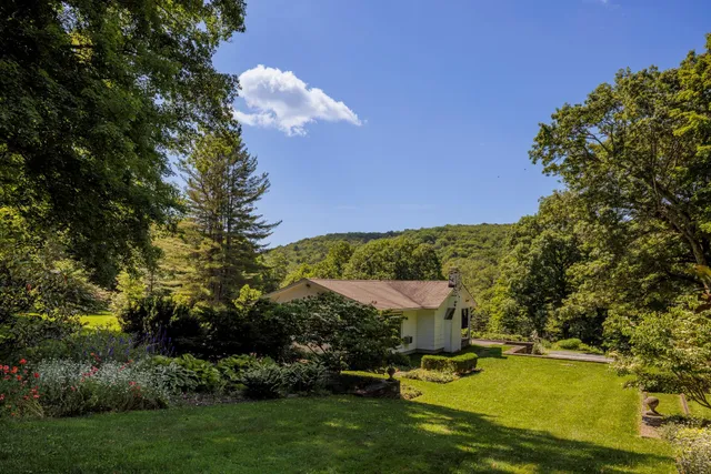 a view of a house with a big yard